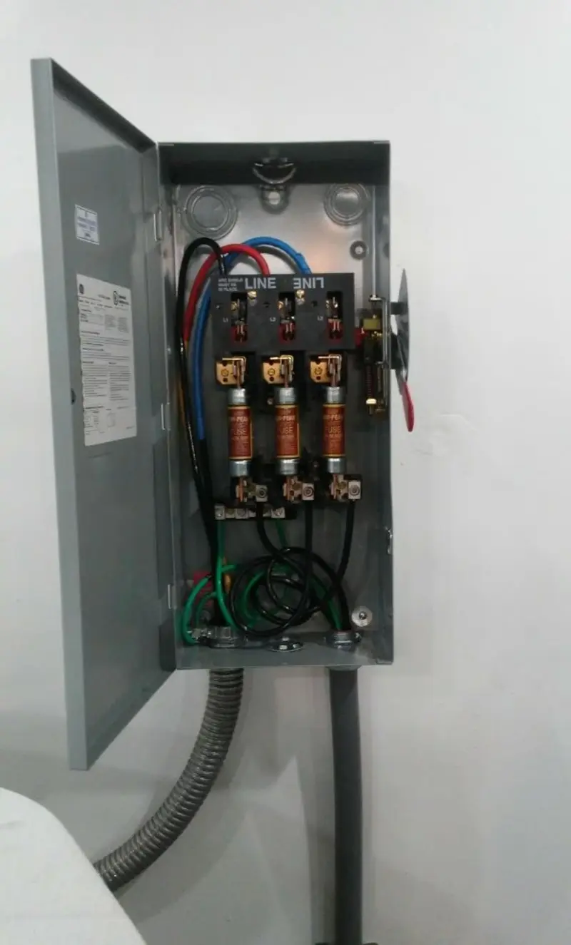 Three-phase disconnect switch installed for Smoke Detector Installation in Lake Delton